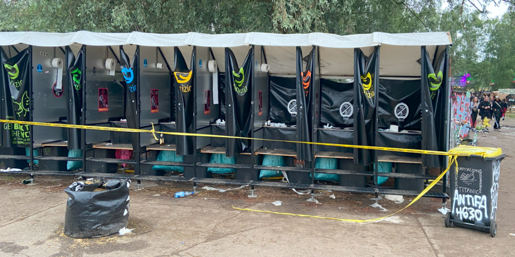 toilets being cleaned by the group of volunteers looking after them 