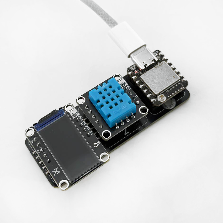 Axiometa Genesis XIAO Shield with a Seeed Studio XIAO
