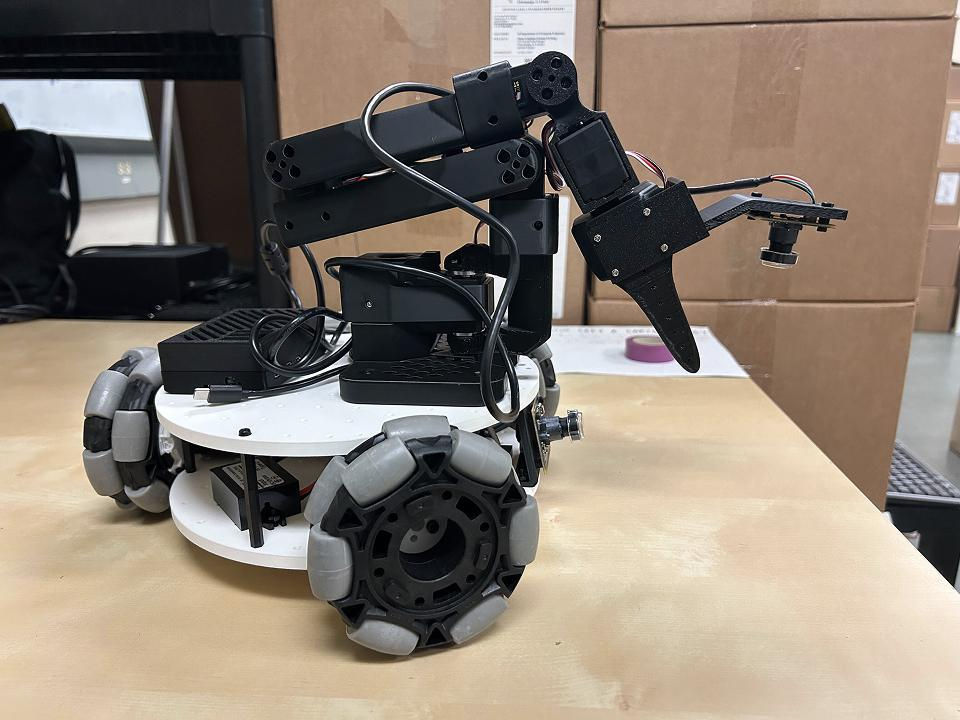 LeKiwi mobile robot with robotic arm for mobile manipulation