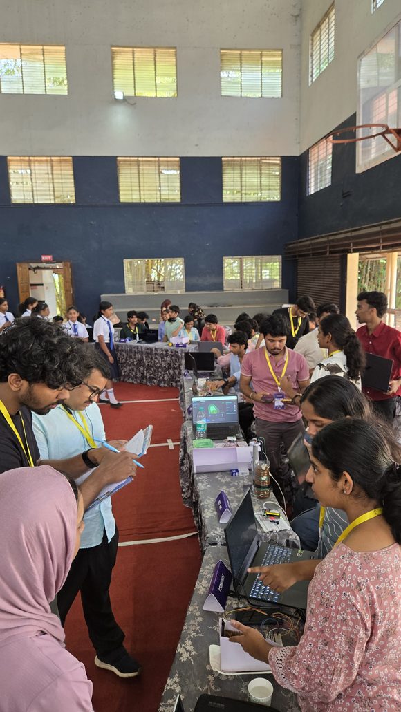 Visitors trying out a project at the EVOKE 2026 expo