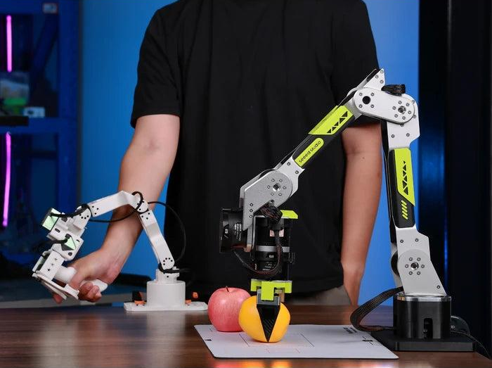 reBot Arm performing a robotic grasping task