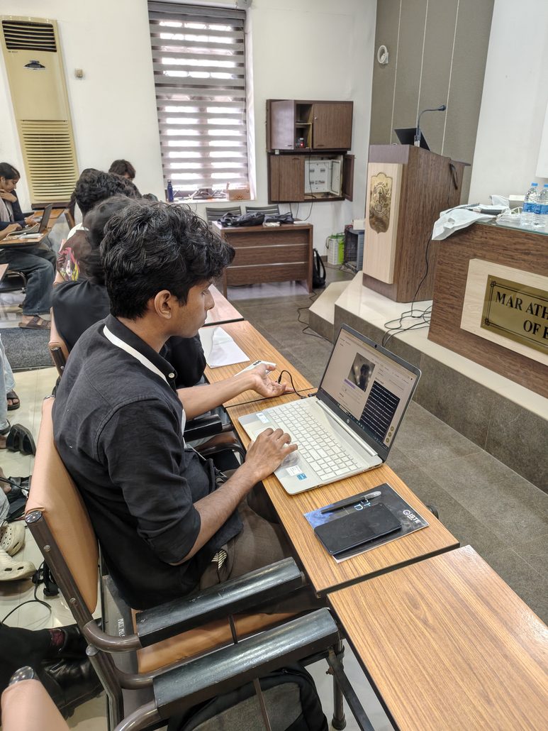 Students training a model in Edge Impulse at the TinyML Workshop