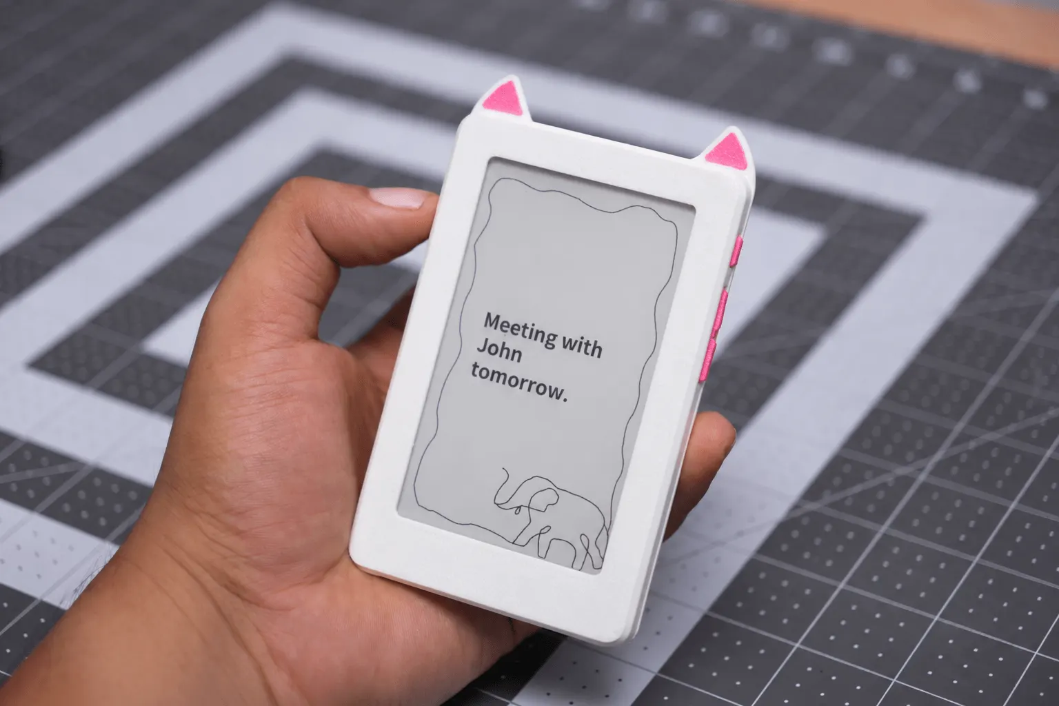 A cute, kitty-themed enclosure for the reTerminal Sticky from Seeed Studio.