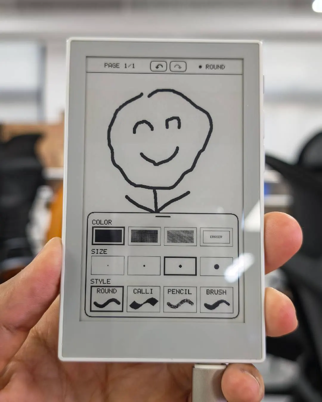 Sticky Handwriting Pad on a real reTerminal Sticky, showing a handwritten smiley and the pen toolbar