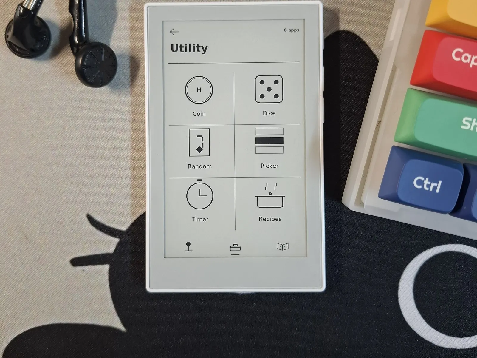 Toybox running on a reTerminal Sticky, showing the Utility drawer: coin, dice, random, picker, timer and recipes